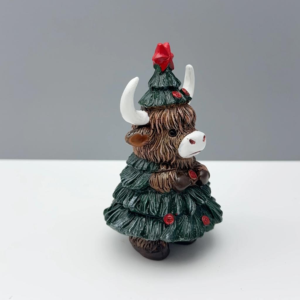 Festive Highland Cow Statue - Adorable resin decor with red berries & pine cones. Perfect holiday desk accent for Christmas! 