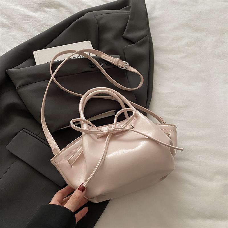 

Повседневная сумка-пельмень мода 2025 новая женская на плечо, мессенджер розовый