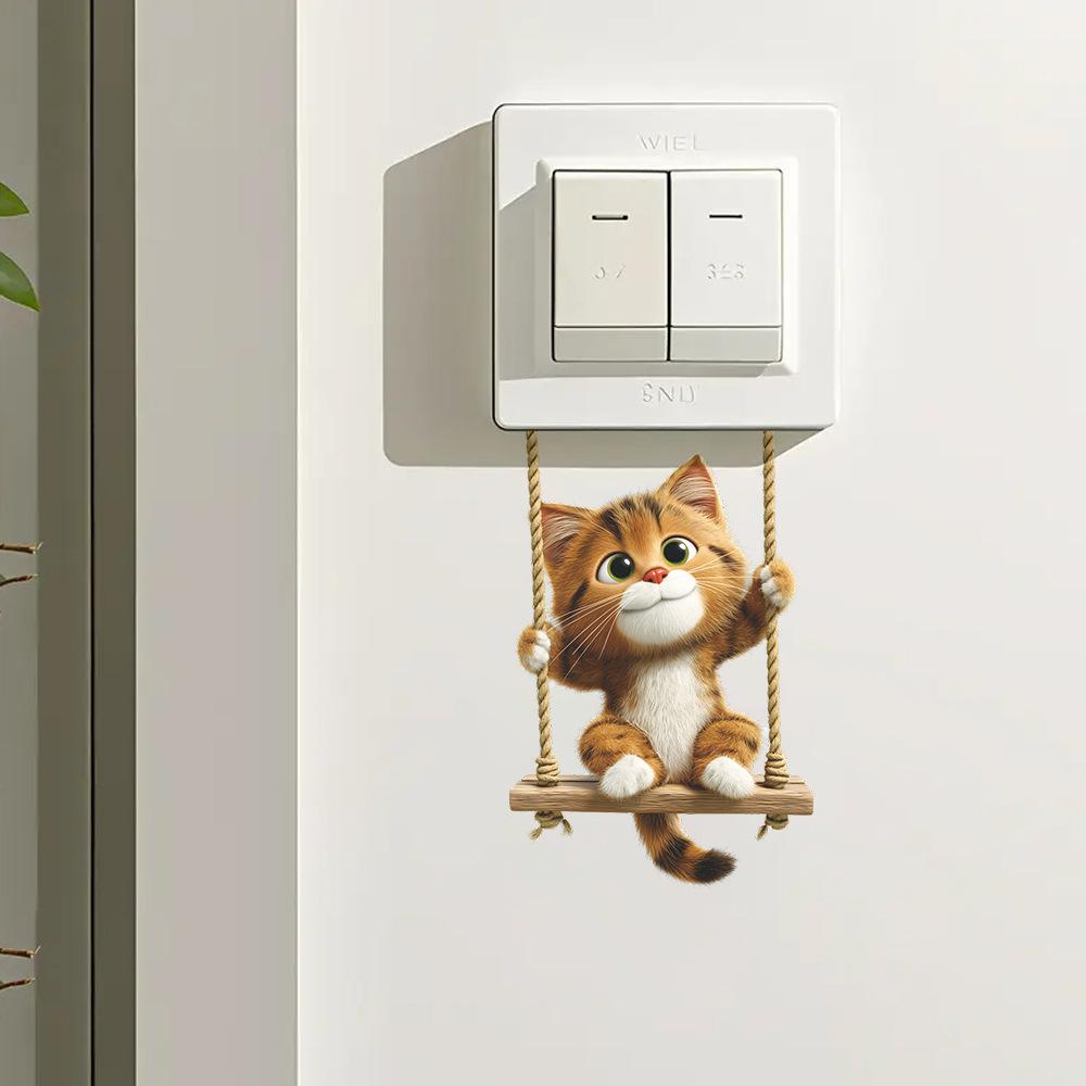 Süße kleine Katze schwingt auf der Schaukel Hauswand Schalter Verschönerungsaufkleber