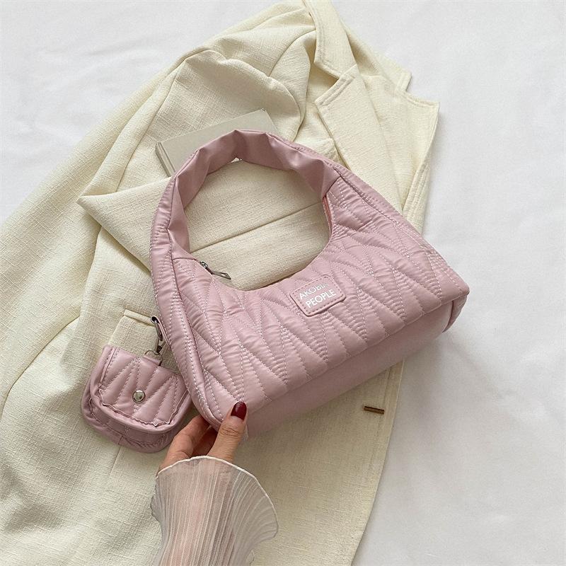 

Popular embroidery thread small bag women s 2025 summer new niche versatile shoulder underarm bag Korean solid color hand bag розовый