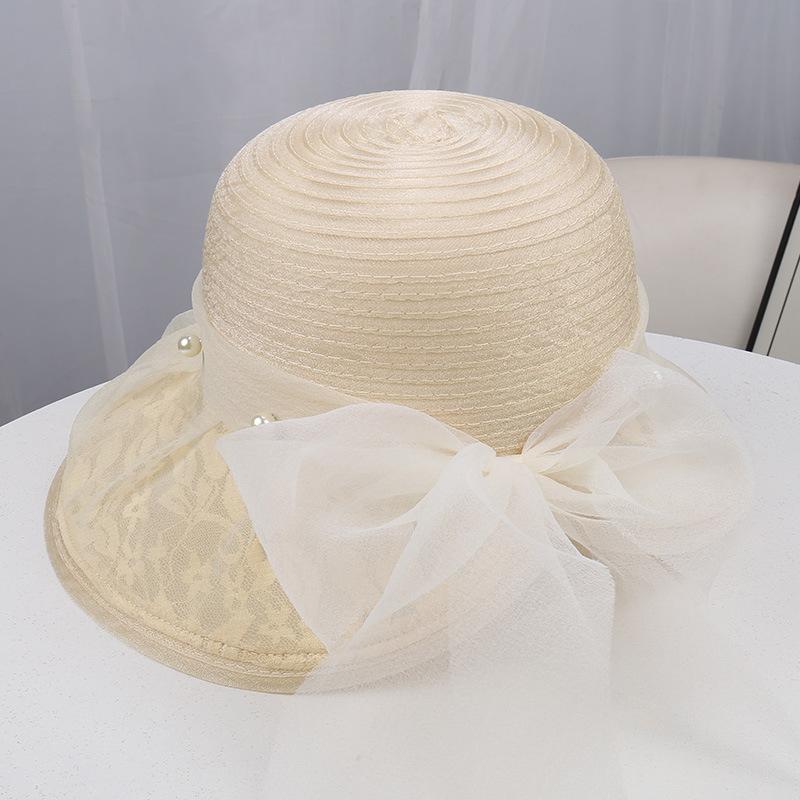 Spring and summer new lace mesh top hat women's sunscreen sun hat pearl bow decorative holiday mesh hat