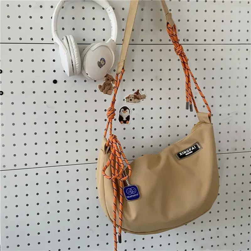 

Новая нейлоновая сумка для закусок унисекс, водонепроницаемая женская, водостойкая, корейская версия, однотонная, вместительная, сумка-мессенджер через плечо