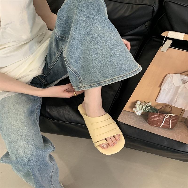 Spring and summer women's outer wear Roman women's shoes one-word seaside beach sandals design sense niche flat-bottomed pinch slippers