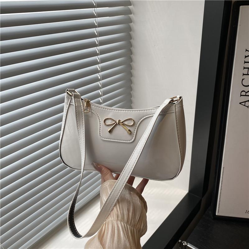 Fashion bow new personality trendy texture commuter underarm shoulder bag women
