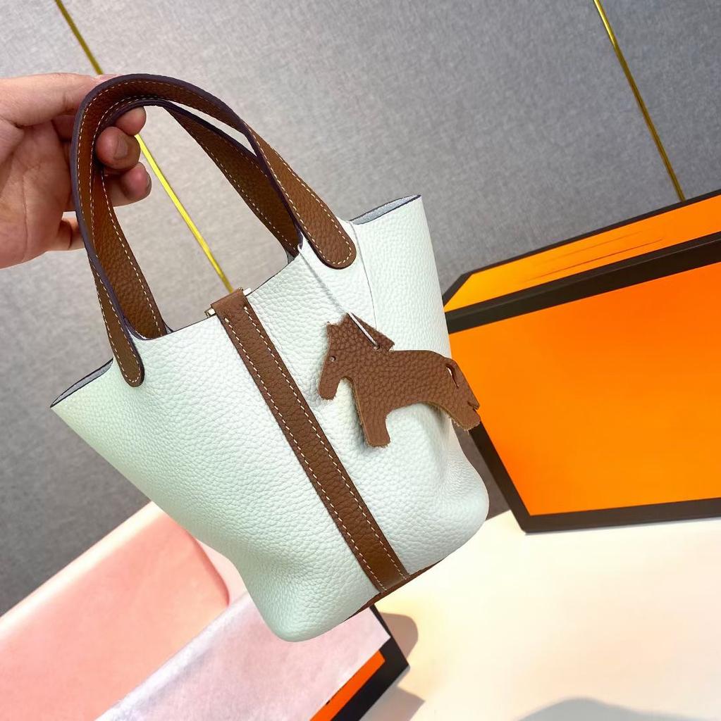 Hochwertige halbhandgefertigte Gemüsekorbtasche togo erste Schicht Rindsleder Pendlertasche echtes Leder tragbare Beuteltasche Damen 18cm