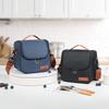 Izolowana torba na lunch crossbody: Gruba folia aluminiowa dla przedłużonej świeżości i zachowania zimna.