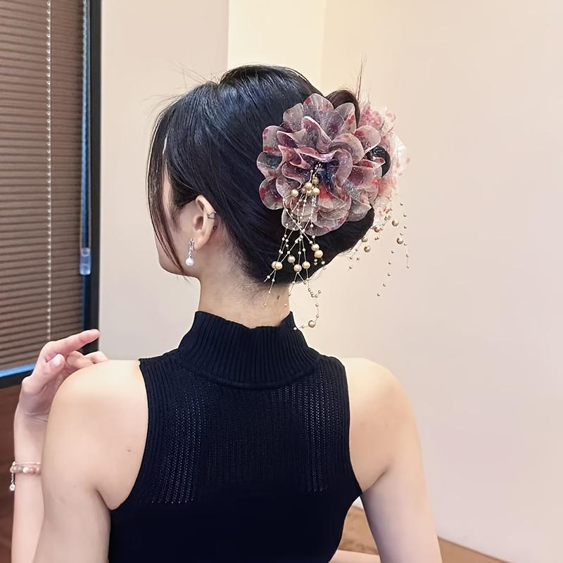 

New Peony Tassel Shark Hair Claw, bowknot floral design with exquisite details, trendy statement hair accessory for special occasions.