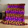 Black leopard spots on a gradient background of orange, pink, and purple. for all seasons blanket lunch break throw gift