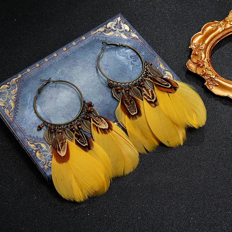 Bohemianische Federohrringe im Retro-Urlaubsstil am Meer, Weiblichkeit, Persönlichkeit, Mode, Fransen, vielseitige Ohrringe