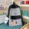 Schoolbag cute small fresh backpack 1011 sweet large capacity Japanese plaid schoolbag women's niche light casual backpack