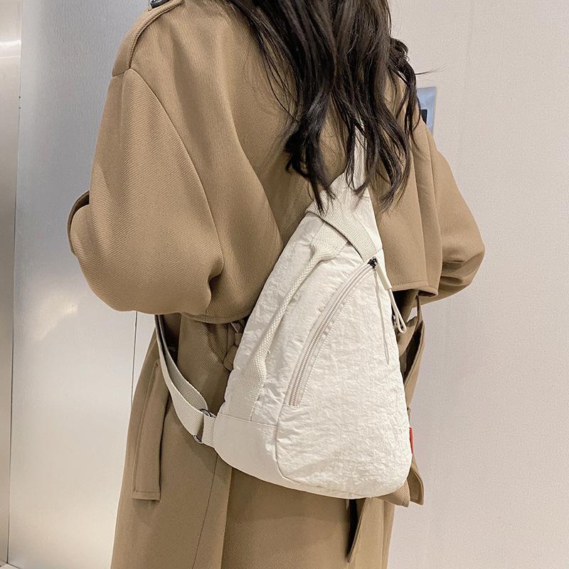 New Japanese simple breast bag couple shoulder messenger bag men's bag large capacity storage bag women