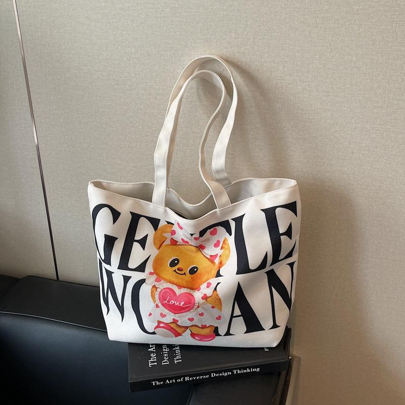 

Canvas bag women s large-capacity new summer versatile shoulder bag casual college student class tote bag чорний