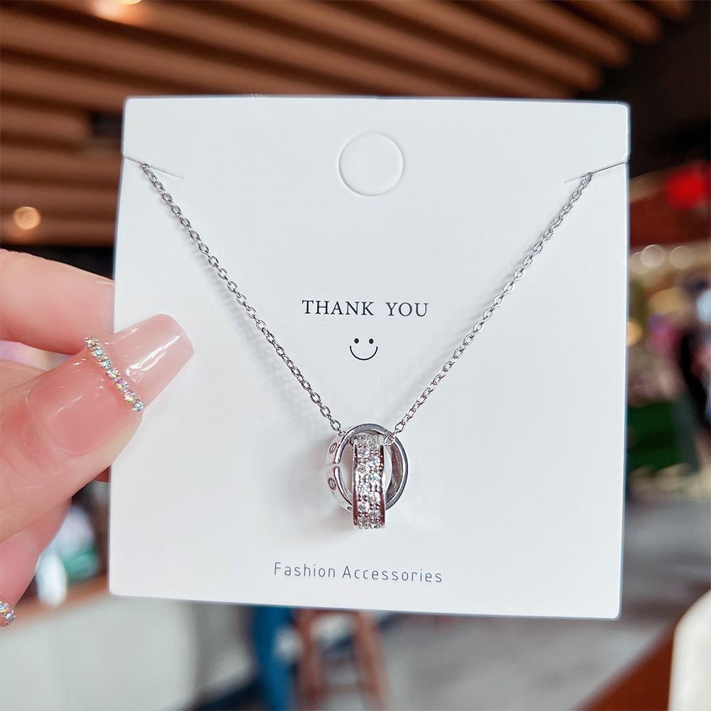 

Модные аксессуары для поездок на работу и обратно, темпераментная римская цепочка с двумя кольцами на ключицу, элегантное женское ожерелье из титановой стали, женское ожерелье-джокер