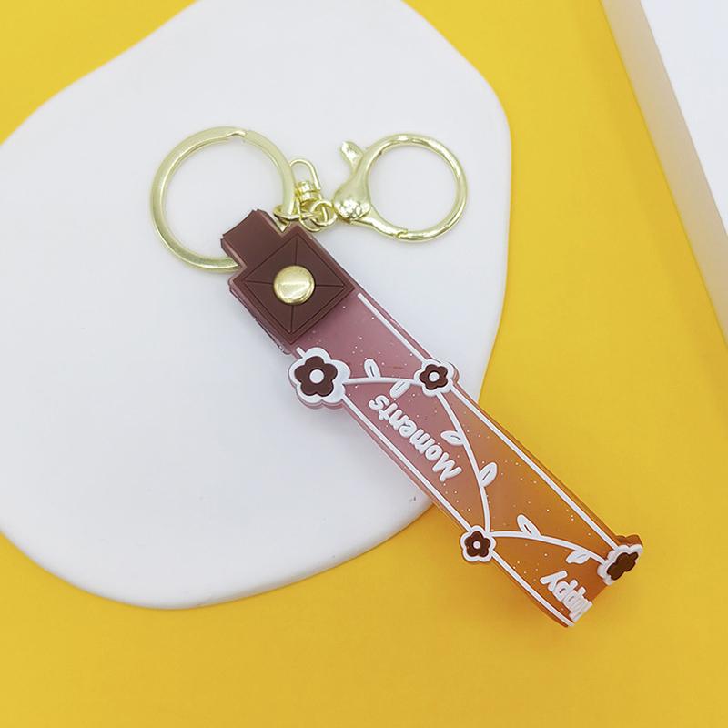 Transparent Pvc Soft Rubber Rope Keychain English Small Flower Jelly Color Plum Blossom Candy Color Drop Adhesive Wristband