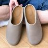 Herrskor Birkenstocks mjuksulade halvtofflor old money-stil muller-tofflor