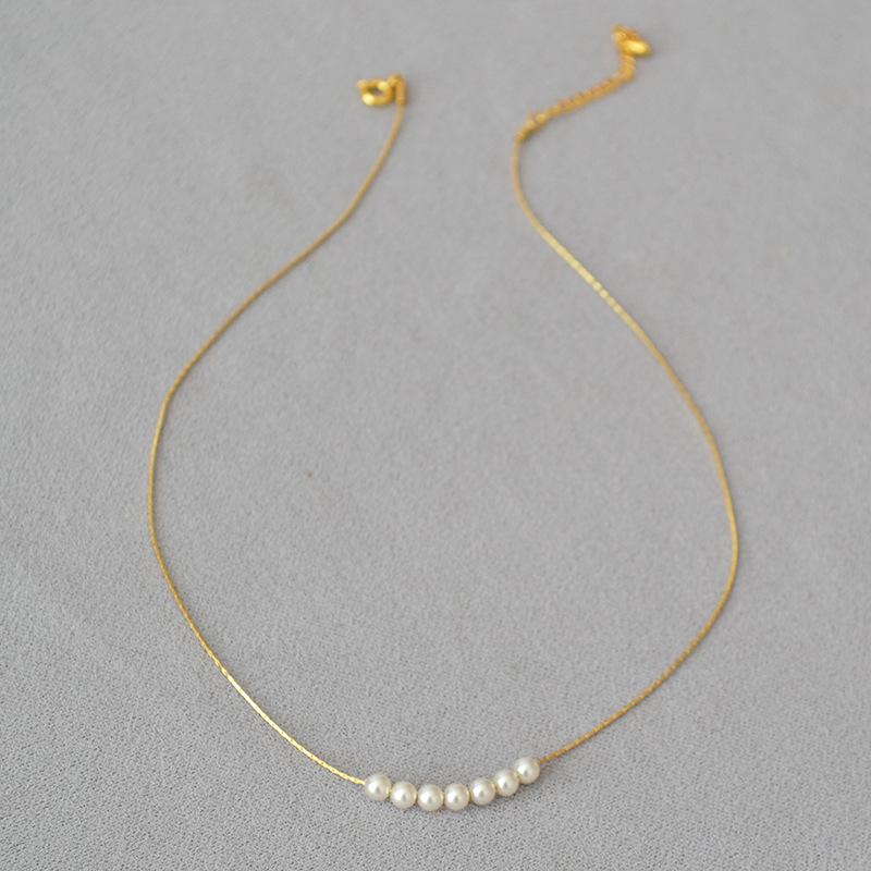 Japanese-Korean Mini High-Gloss Genuine Pearl Necklace: Gold-Plated Brass, Delicate Clavicle Chain for Women.