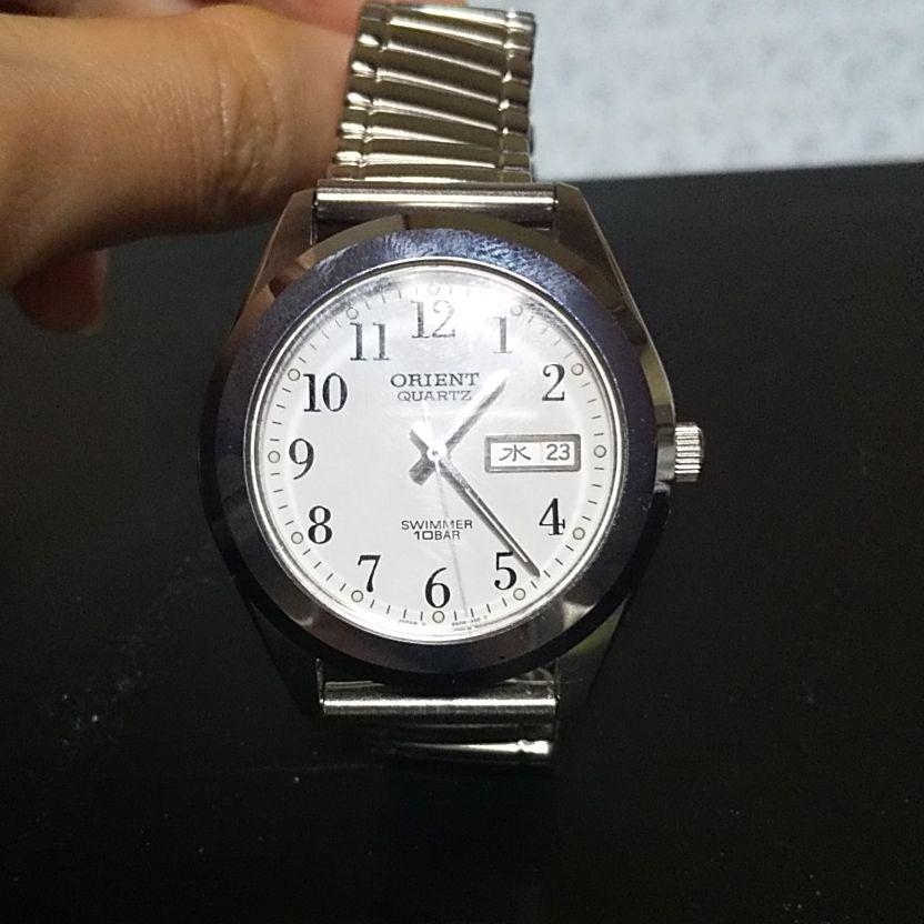Used ORIENT QUARTZ SWIMMER 10BAR watch silver day date 00s y2k operation