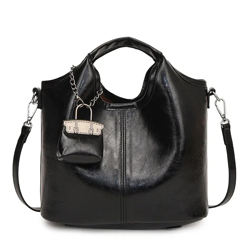 

Мягкая кожаная женская сумка для ручной клади большой вместимости, новая высококачественная и нишевая сумка через плечо на одно плечо