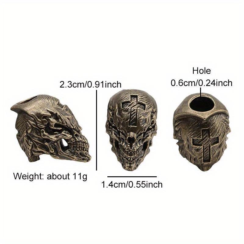 Cross Skull Head Mosazný nůž Korálky EDC DIY Paracord Tkané náramky Přívěsky na řetízky Příslušenství Venkovní závěsy na nářadí Tretky