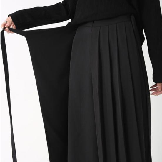 Pantaloni da donna stile scuro nero tinta unita plissettati finti due pezzi irregolari high street larghi gamba larga casual individuali lunghezza a metà polpaccio pantaloni culottes