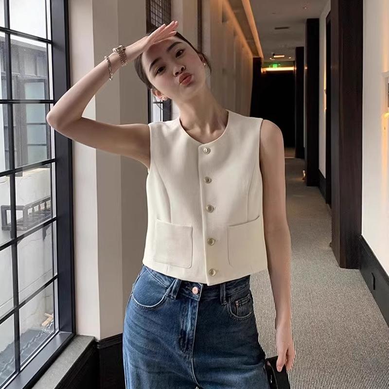 Dames fransk rund hals enkeltspent dobbel lomme ermeløs avslappet strikket vest