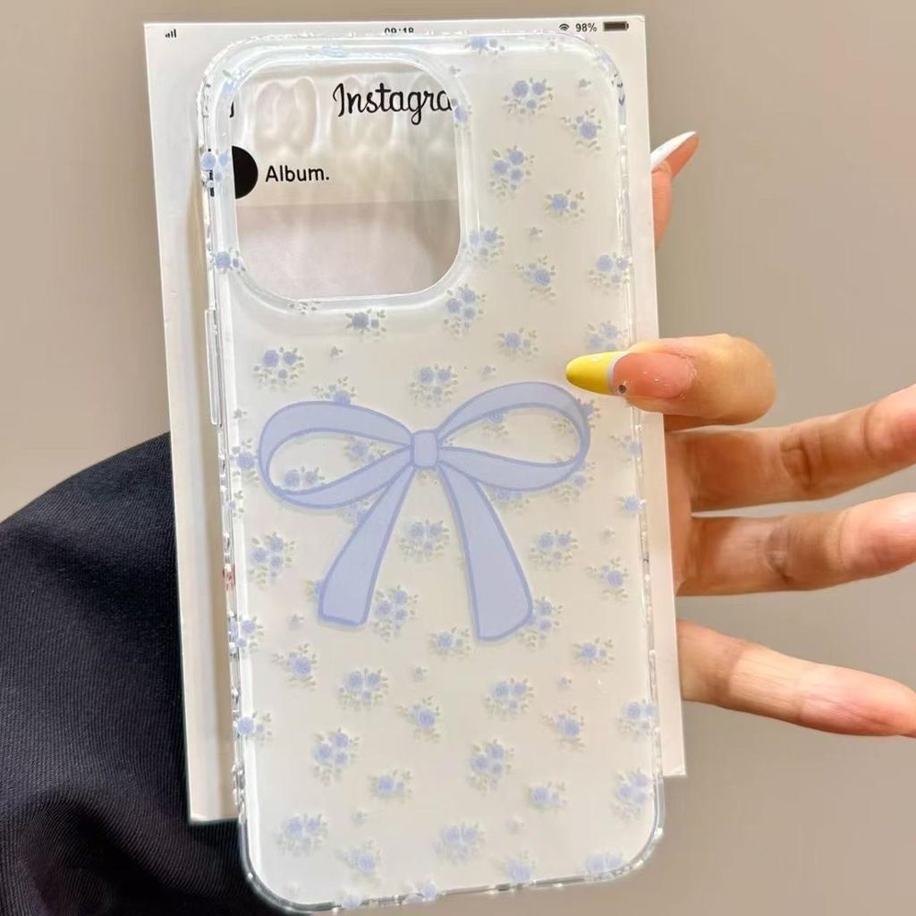 The new IMD white background is suitable for Apple 16ProMax mobile phone case iPhone17/14Pro blue bow 15/13.