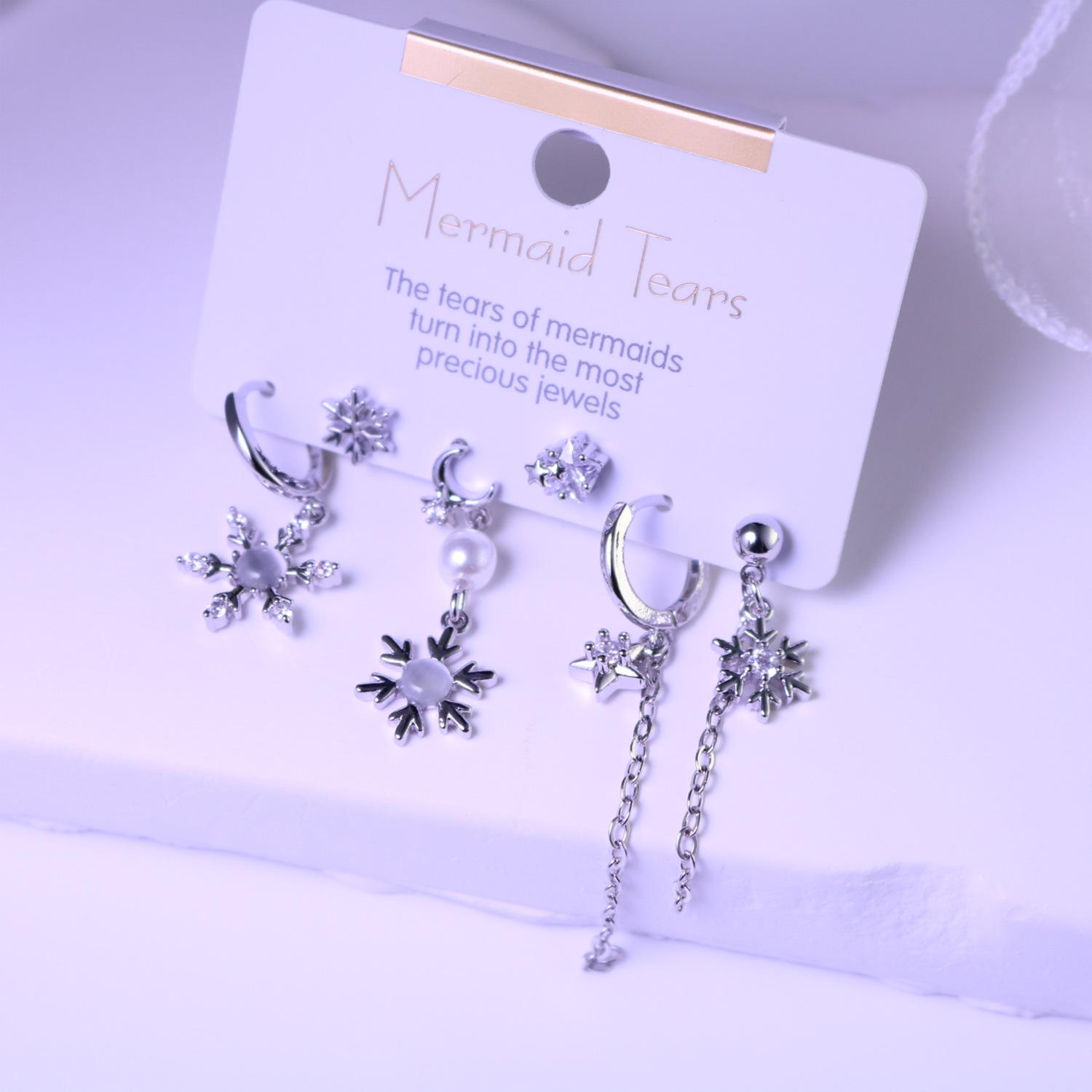 

Luxurious Rotating Snowflake Earrings: High-End Light Luxury Design