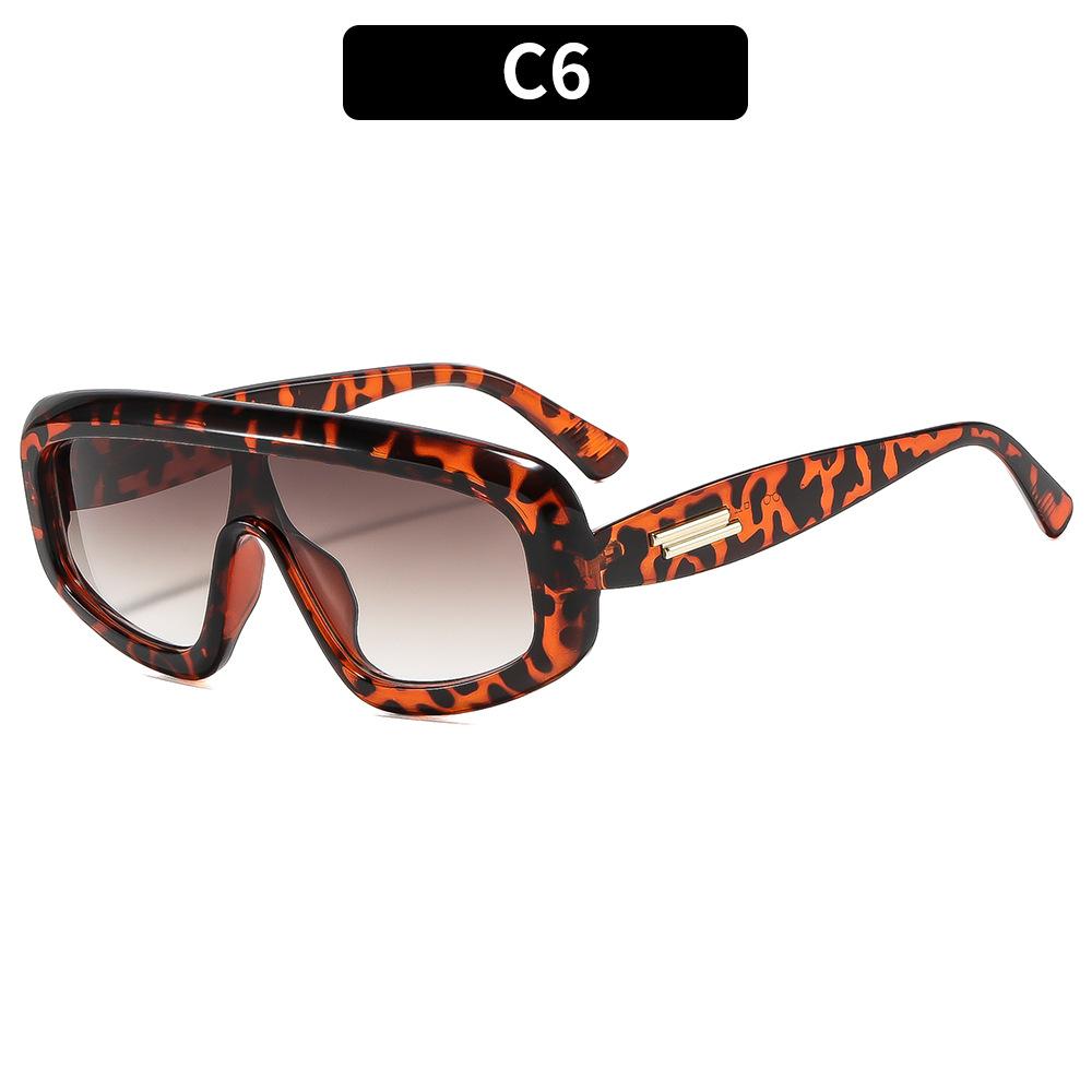 Retro-style one-piece lens glasses for street fashion, hip-hop trend sunglasses, and outdoor sun-protection shades.