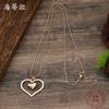New Glossy Hollow Love Snake Bone Chain Long Pendant Women's Simple and Advanced Autumn and Winter Heart-shaped Long Necklace