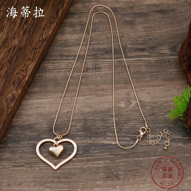 New Glossy Hollow Love Snake Bone Chain Long Pendant Women's Simple and Advanced Autumn and Winter Heart-shaped Long Necklace