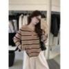 A Retro Loose One-shoulder Striped Halter Long-sleeved Knitted Top for Women with A Contrasting Color Design In Early Autumn