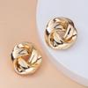 Boucles d'oreilles puces en métal doré, style spirale, pour femme. Nouveauté bijoux en gros.
