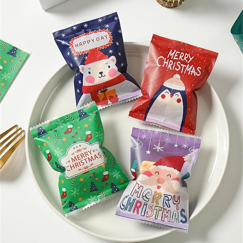 100Pcs 7x10cm Plastic Christmas Machine Sealed Bags Snowflake Pastry Candy Cookie Xmas Party Gift Packaging Supplies
