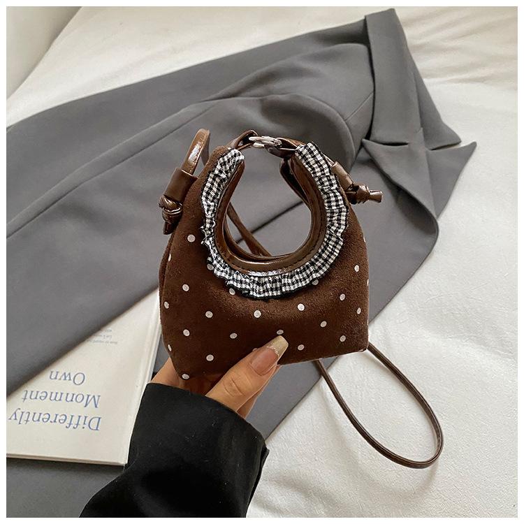 

Korean version of mini small bag women s 2025 new retro messenger bag lace polka dot hand carry lipstick bag change bag tide