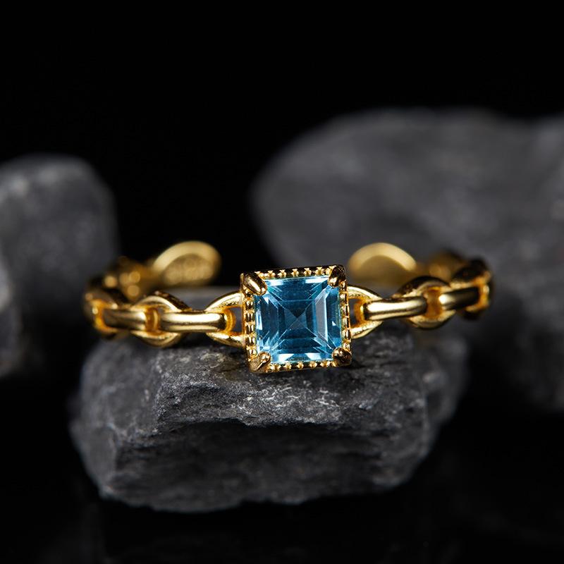 

Color Treasure Ring S925 Sterling Silver Inlaid Natural Topaz Sugar Cube Open Ring Ring Fashion High Sense Women золотий