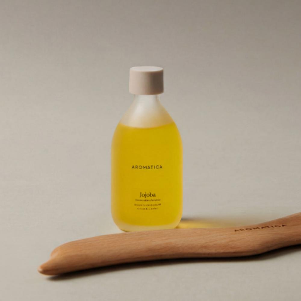 

AROMATICA Organic Golden Jojoba Oil 100ml & Dolphin Body Gua Sha Massage 2-Piece Set Professional Body Ritual & Intensive Moisture Duo