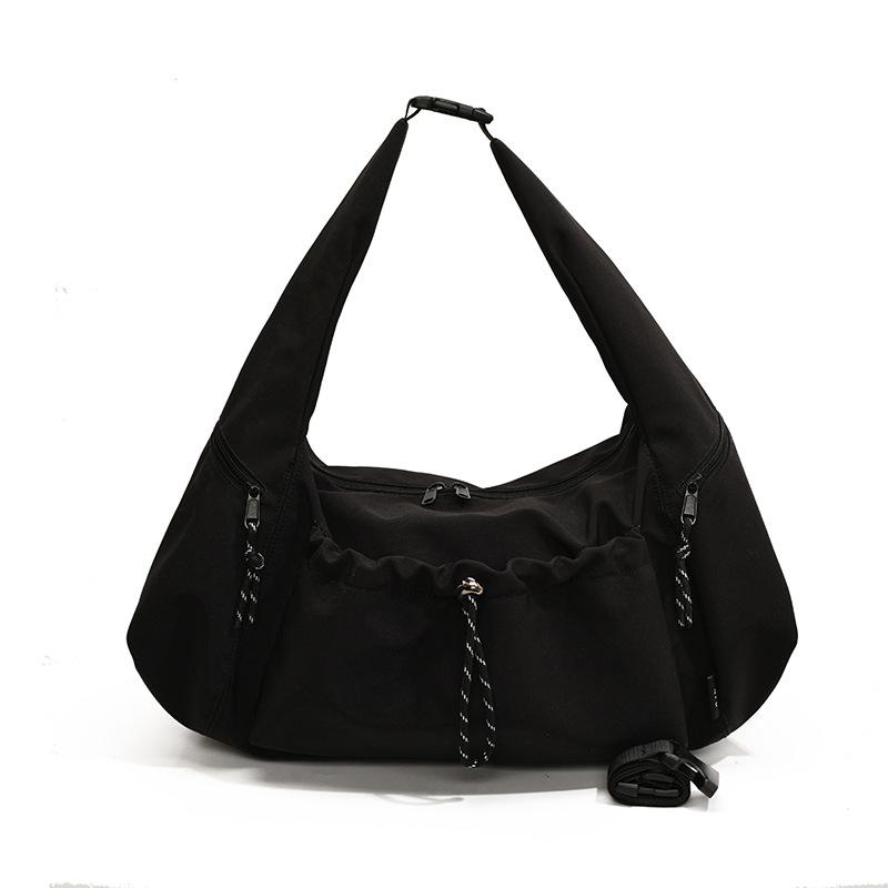 Large capacity nylon cloth pleated bag women's autumn leisure 2025 new leisure messenger large bag commuter dumpling bag