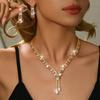 Sencillo y elegante, conjunto de cuatro piezas de alta calidad: collar, pendientes, pulsera y anillo de oro. Los productos nuevos se venden bien