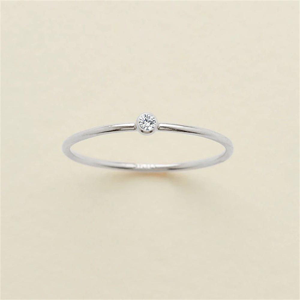 eManco Gold-Plated Non-Constricting Ring for Women - Thin Band with Tiny Diamond Accents and December Birthstone