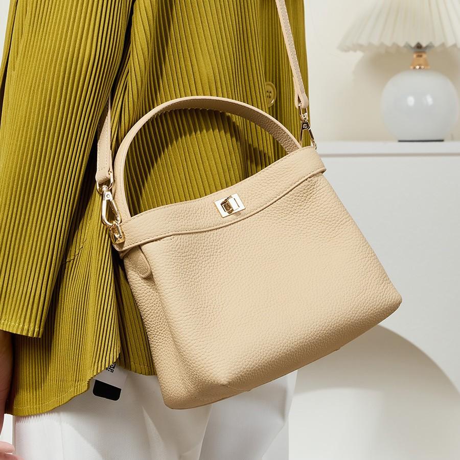 Niche design commuter handbag, high-end genuine leather crossbody bucket bag, single shoulder women's ins-style bucket bag