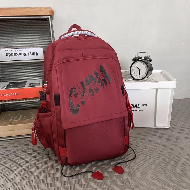 

New schoolbag female junior high school college student versatile backpack large capacity travel backpack male fashion