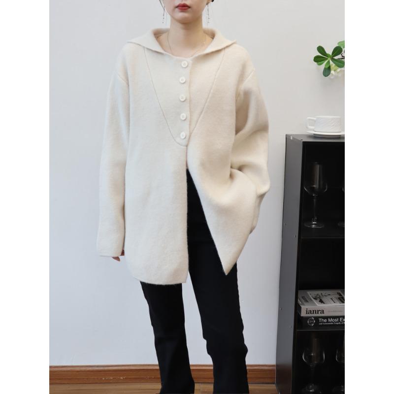 Autumn and winter new hooded design sense medium and long sweater jacket solid color loose high sense knitted cardigan women
