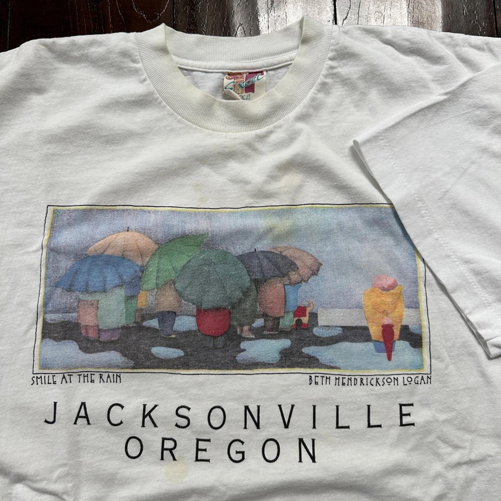 

Jacksonville Oregon Smile at Rain VTG T Shirt Beth Logan Art PDX Umbrella Sad L
