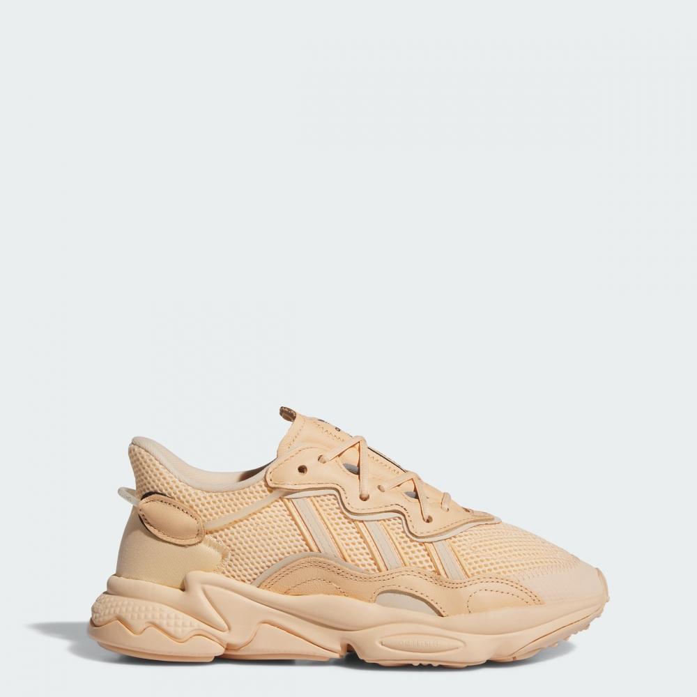 

adidas Women s adidas OZWEEGO Shoes glow orange crystal sand core black