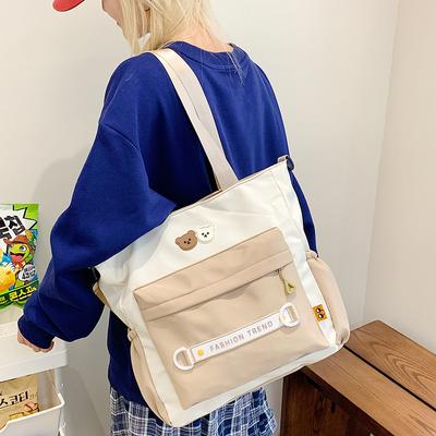 Neue tragbare Umhängetasche, Schultasche für Studenten mit großem Fassungsvermögen, Kosmetiktasche, lässiger vielseitiger Rucksack, Umhängetasche.