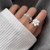 Exquisite Adjustable Hollow Flower Ring - Women's Versatile Sweet Ins Style Design, Perfect for Stacking and Styling on Any Finger.
