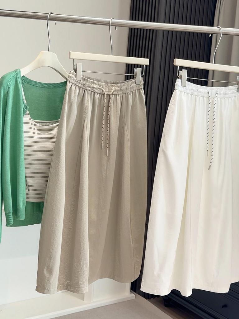 Women's High-Waist Pumpkin Midi Skirt: Solid Color, Elastic Drawstring, Slimming Bud Design, Perfect for Spring