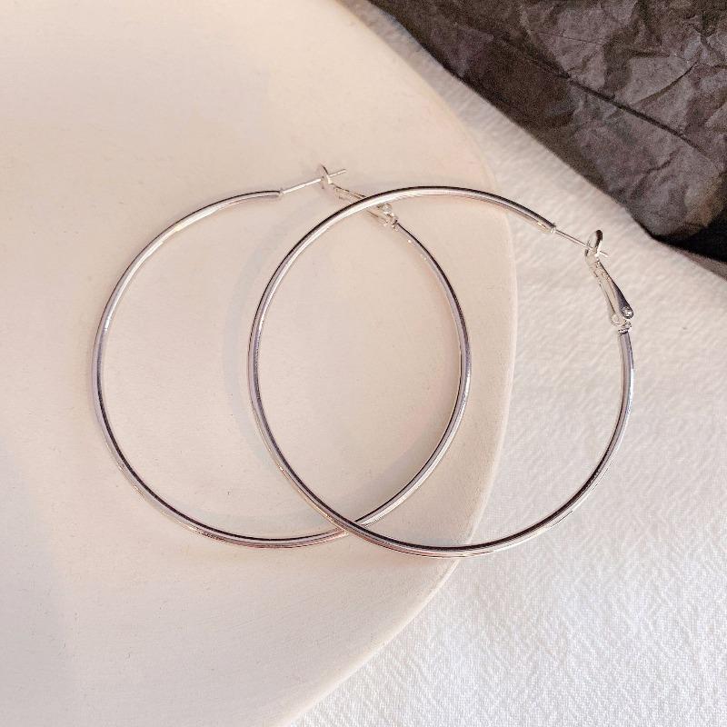 Astronomical Ring Earrings for A Cold and Elegant Style. Versatile Metal Ear Hoops with Silver Pins As Jewelry.