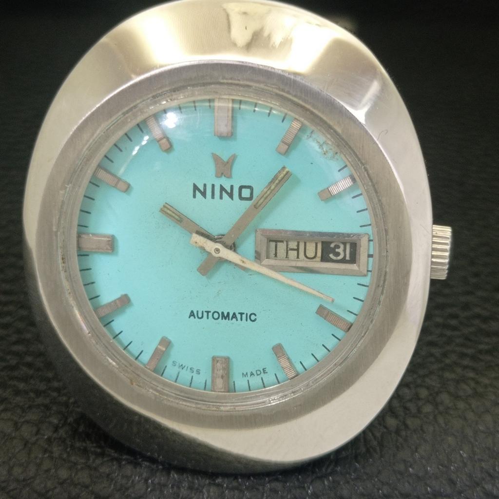 VINTAGE NINO AUTOMATIC 2066 SWISS MENS SEA GREEN COLOR DIAL WATCH a703032-1