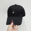 The new Japanese soft-top baseball hat for men and women is simple and versatile, and the small H letter embroidered cap has a curved brim to show